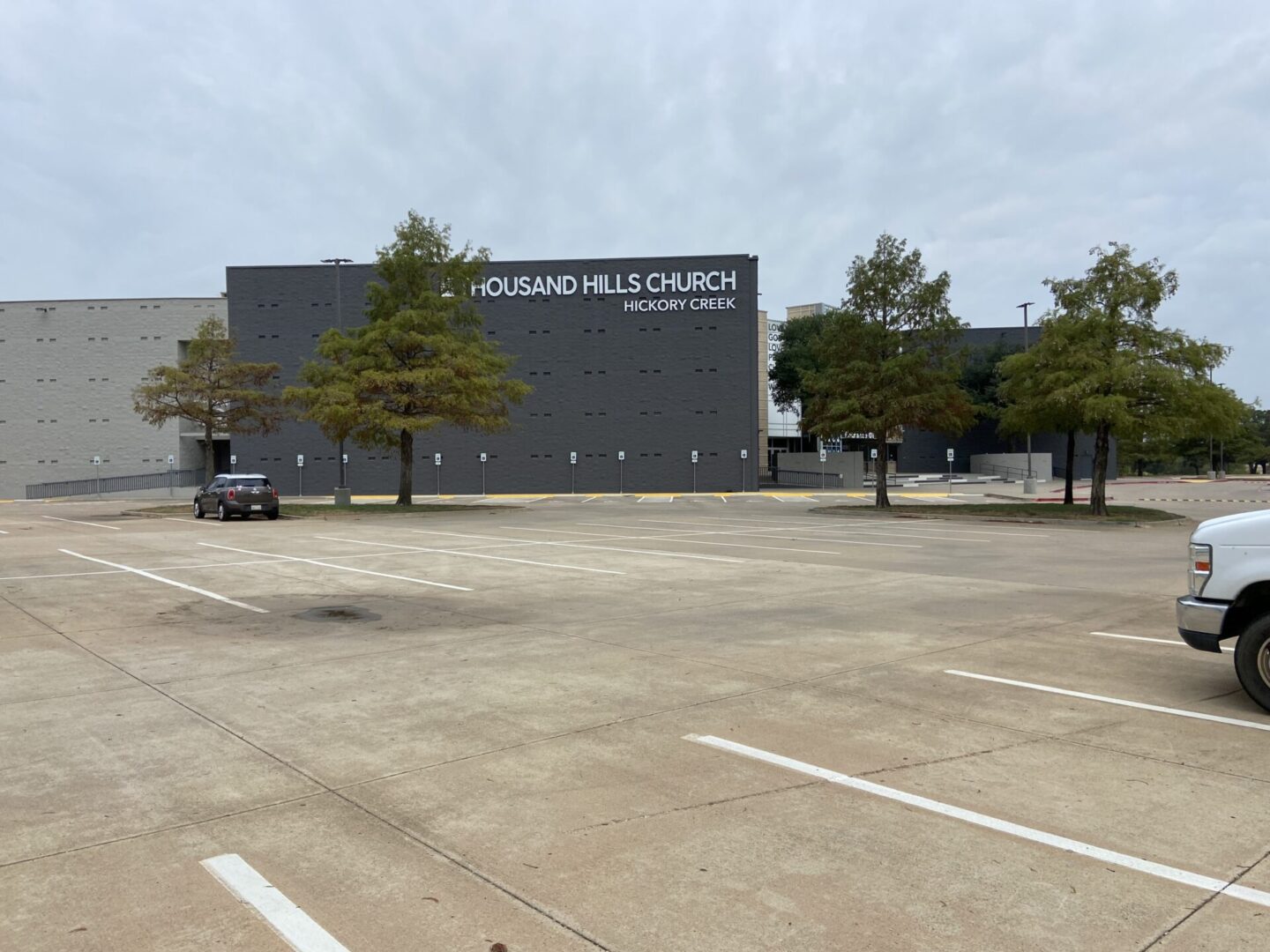 A parking lot with cars parked in it.